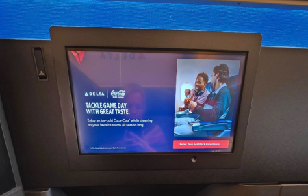 The entertainment screen in a Delta One suites aircraft