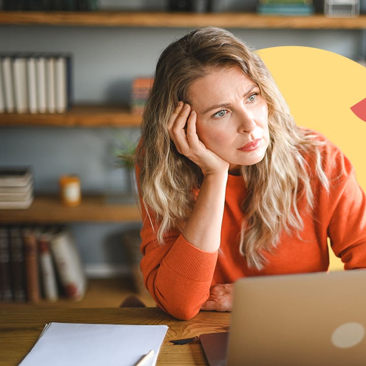 Woman sitting in front of a laptop